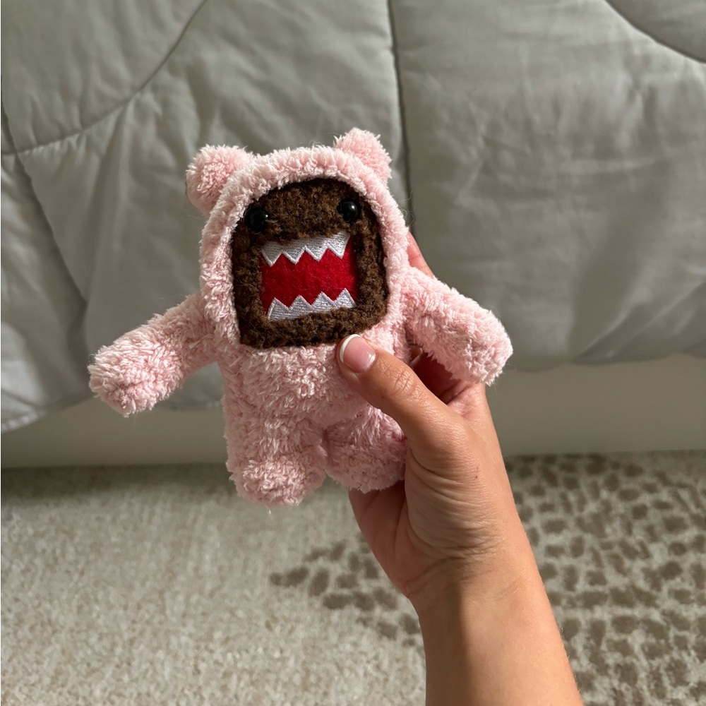 DOMO keychain plushie (pink bear costume)